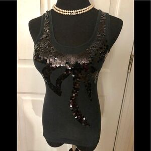 Cute tank by Miley Cyrus in XS